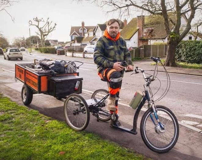 Joe on the You Need Joe trike, towing the signwritten trailer