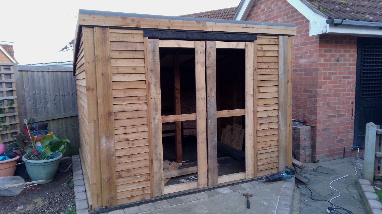 Timber outbuilding built from scratch with double doors