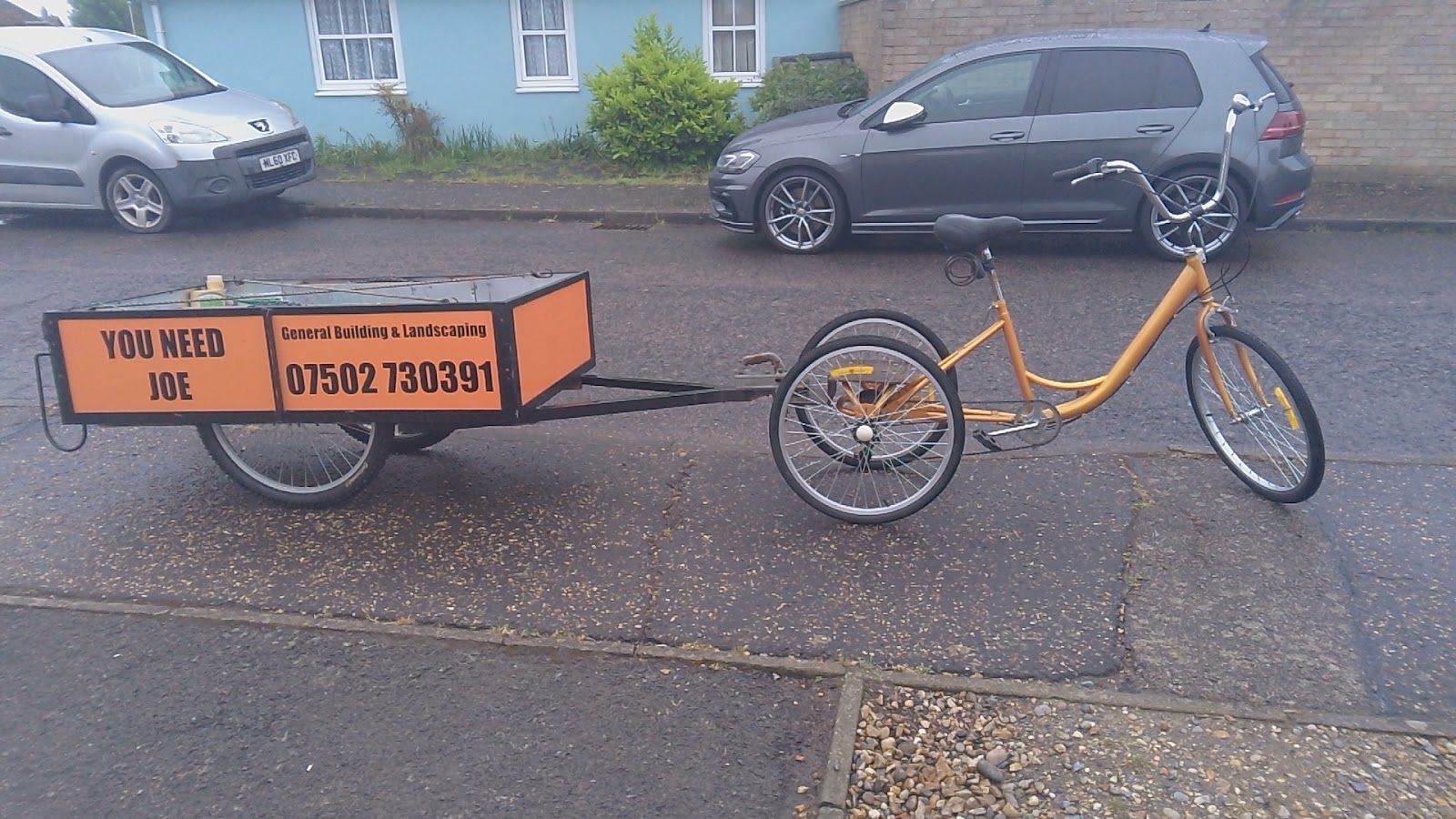 The You Need Joe trailer, signwritten with general building and landscaping branding