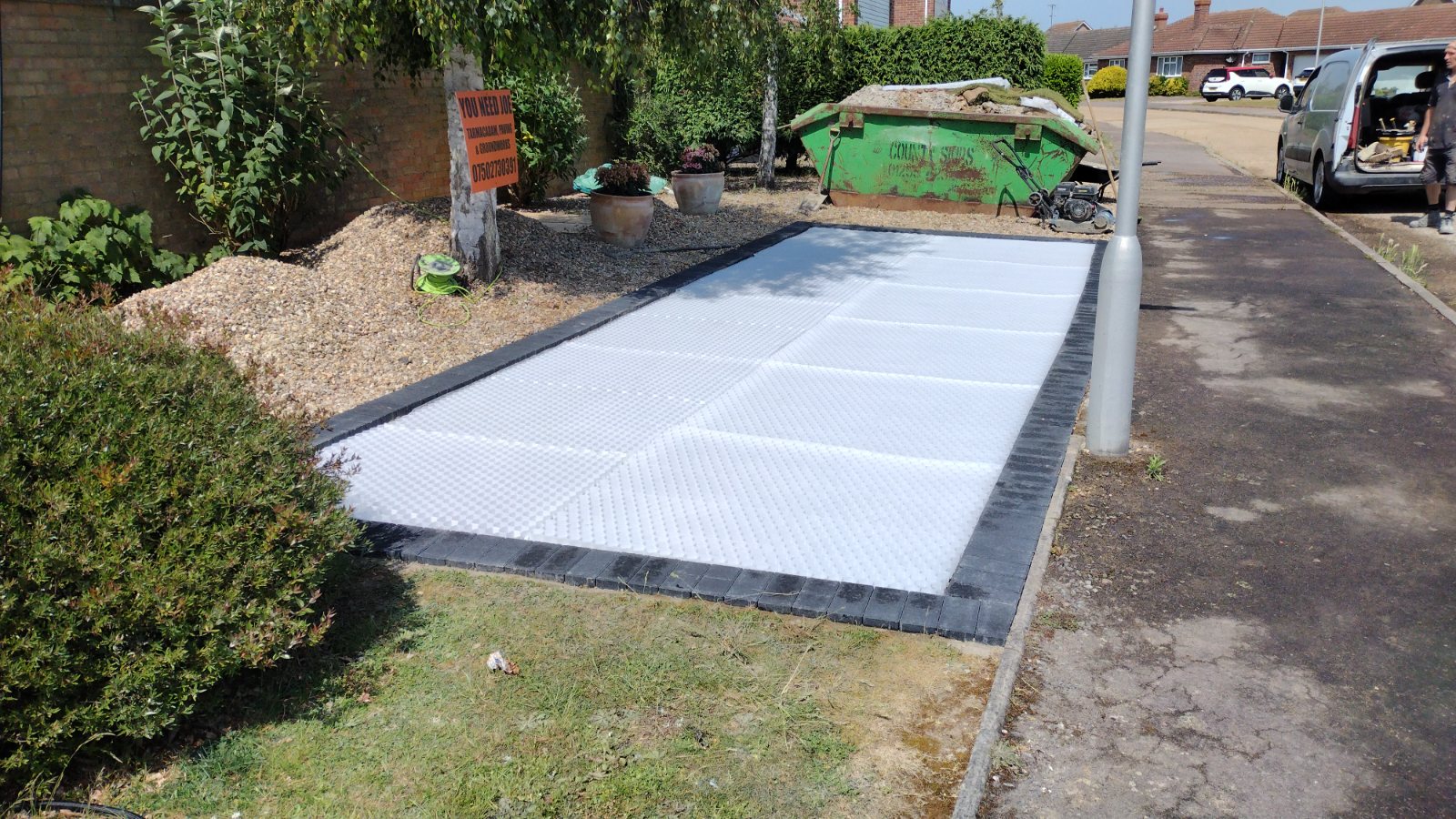 Block paving laid in a herringbone pattern