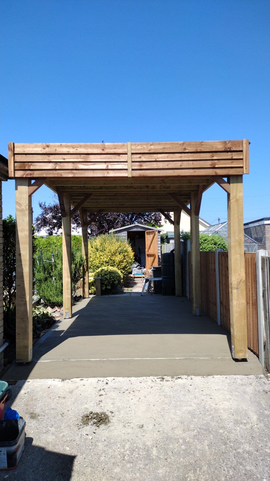 Block-paved patio with garden dining table and chairs